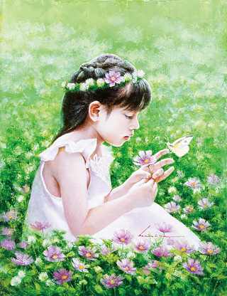 花畑で蝶を見つめる女の子
